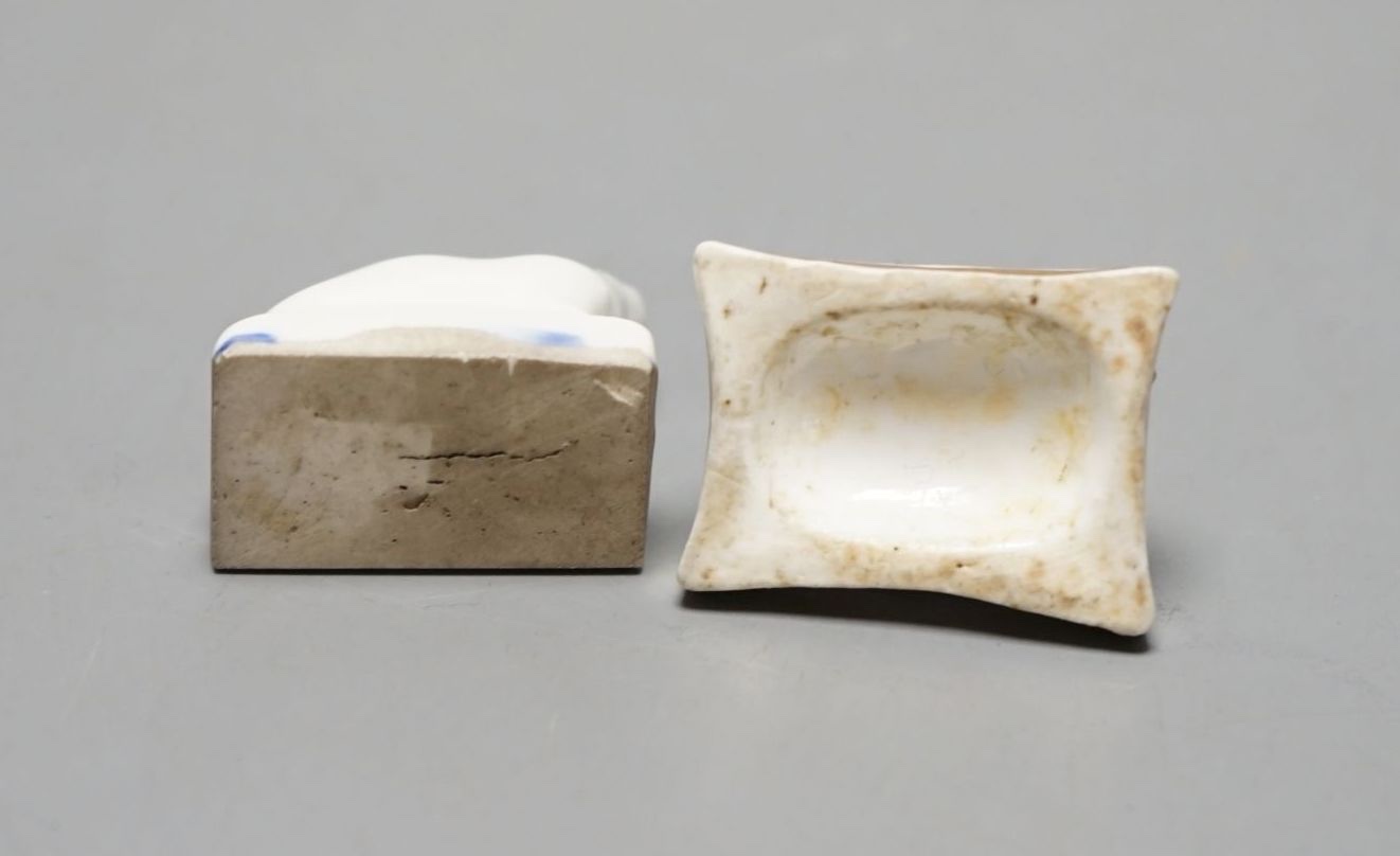 A rare Chamberlain Worcester model of a recumbent kitten, c.1820–40 and a Staffordshire porcelain model of a recumbent kitten, c.1830–50 (2). Cf. Dennis G Rice, Cats in English porcelain, colour plate 29 for the same Cha
